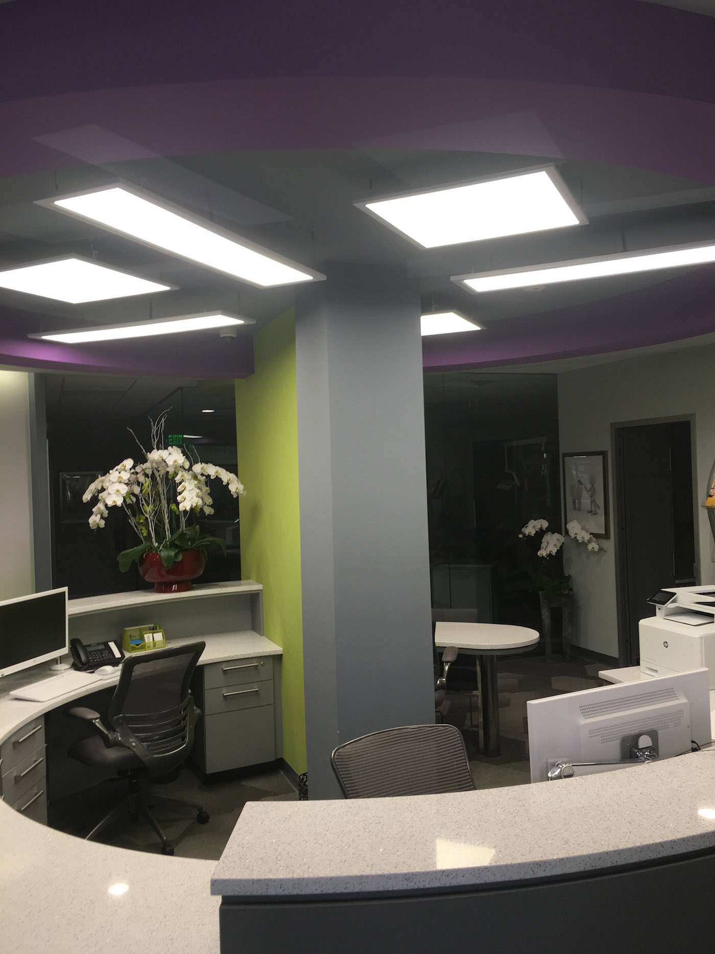 Lighting over a reception desk in an office setting
